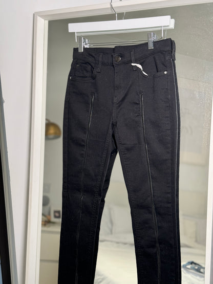 Black zip front skinny jeans